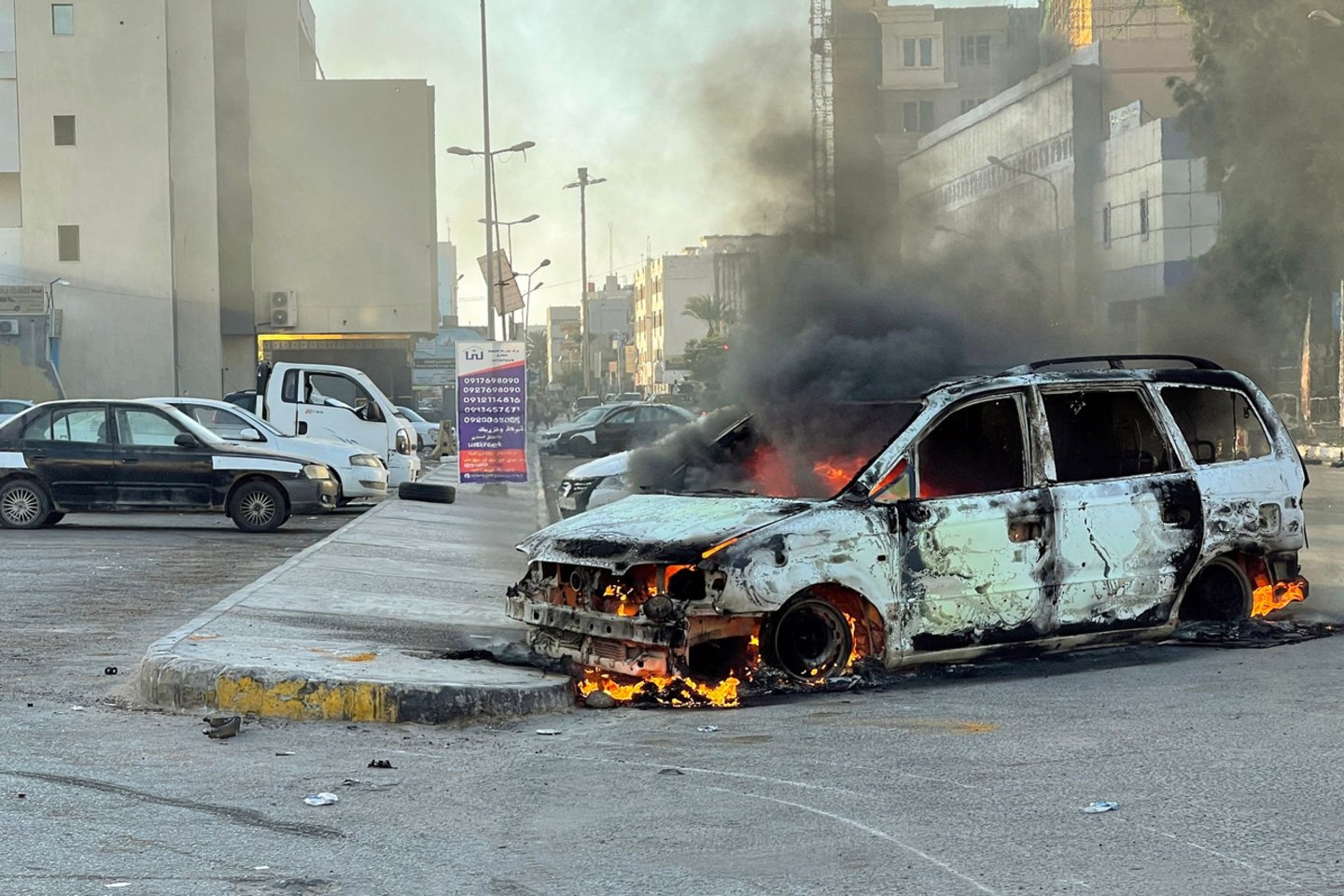 Libijoje per susirėmimus tarp konkuruojančių šalies vyriausybių rėmėjų žuvo mažiausiai 32 žmonės.<br>AFP/Scanpix nuotr.