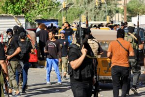 Neramumai Irake: M. Sadras liepė savo sekėjams per valandą palikti Bagdado Žaliąją zoną