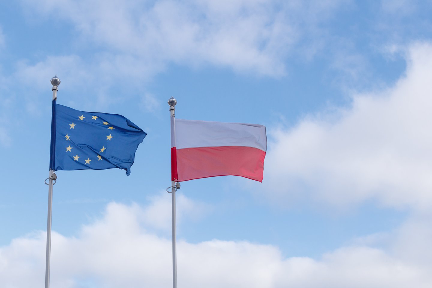 Lenkijos ir ES vėliavos.<br>123rf nuotr.