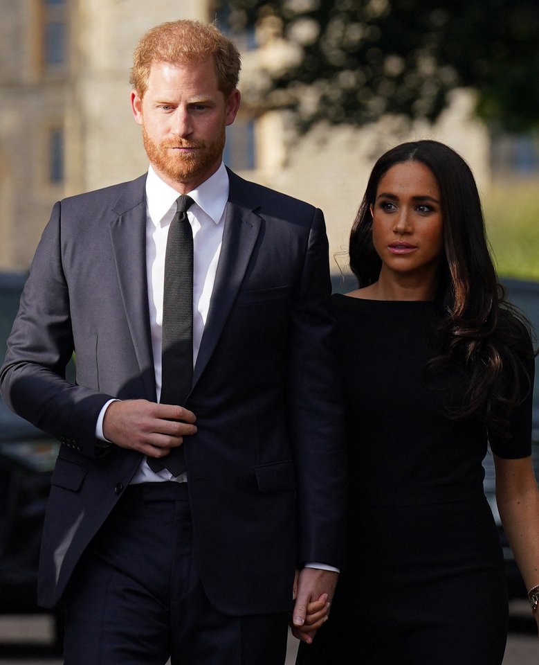  Princas Harry ir Meghan Markle.<br>AFP/ Scanpix nuotr.