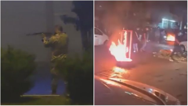 Vaizdai iš protestų Irane: deginami automobiliai, pareigūnai iš automato šaudo protestuotojų kryptimi