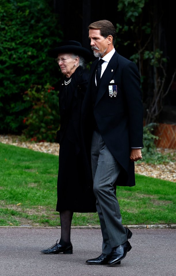 Danijos karalienei Margrethe II (82 m.), dalyvavusiai Jungtinės Karalystės monarchės Elžbietos II laidotuvėse Londone, testu patvirtintas koronavirusas.<br>AFP/Scanpix nuotr.
