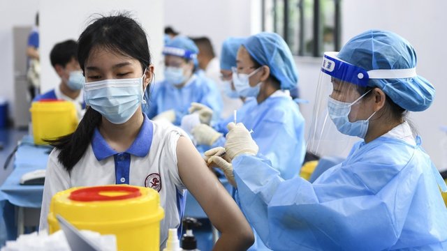 Chaosas Kinijos ligoninėse: besikreipiančiųjų į medikus skaičius išaugo 4 kartus