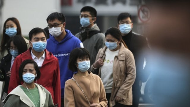 Kinijoje plintantis koronavirusas sėja nerimą pasaulyje: JAV besibaimindamos įvedė naujus ribojimus