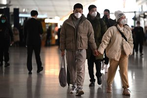 Pietų Korėja dėl išaugusių COVID-19 atvejų taikys apribojimus turistams iš Kinijos