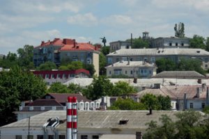 Rusai bando bet kokia kaina parduoti turimą NT Kryme – mažina sumas net perpus