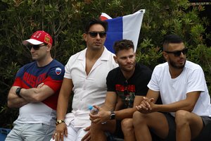 „Australian Open“ aikštynuose išlindusias Rusijos vėliavas teko paslėpti