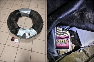 Pasieniečiai iš Nemuno ištraukė automobilio padangą su rūkalais