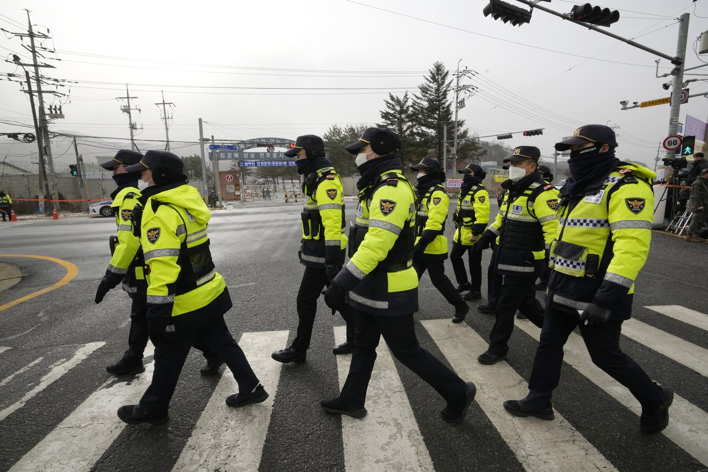  Pietų Korėjos policija.<br> AP/Scanpix nuotr.