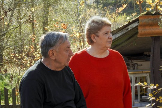 Larisa Kalpokaitė su vyru sodyboje<br>V.Ščiavinsko nuotr.