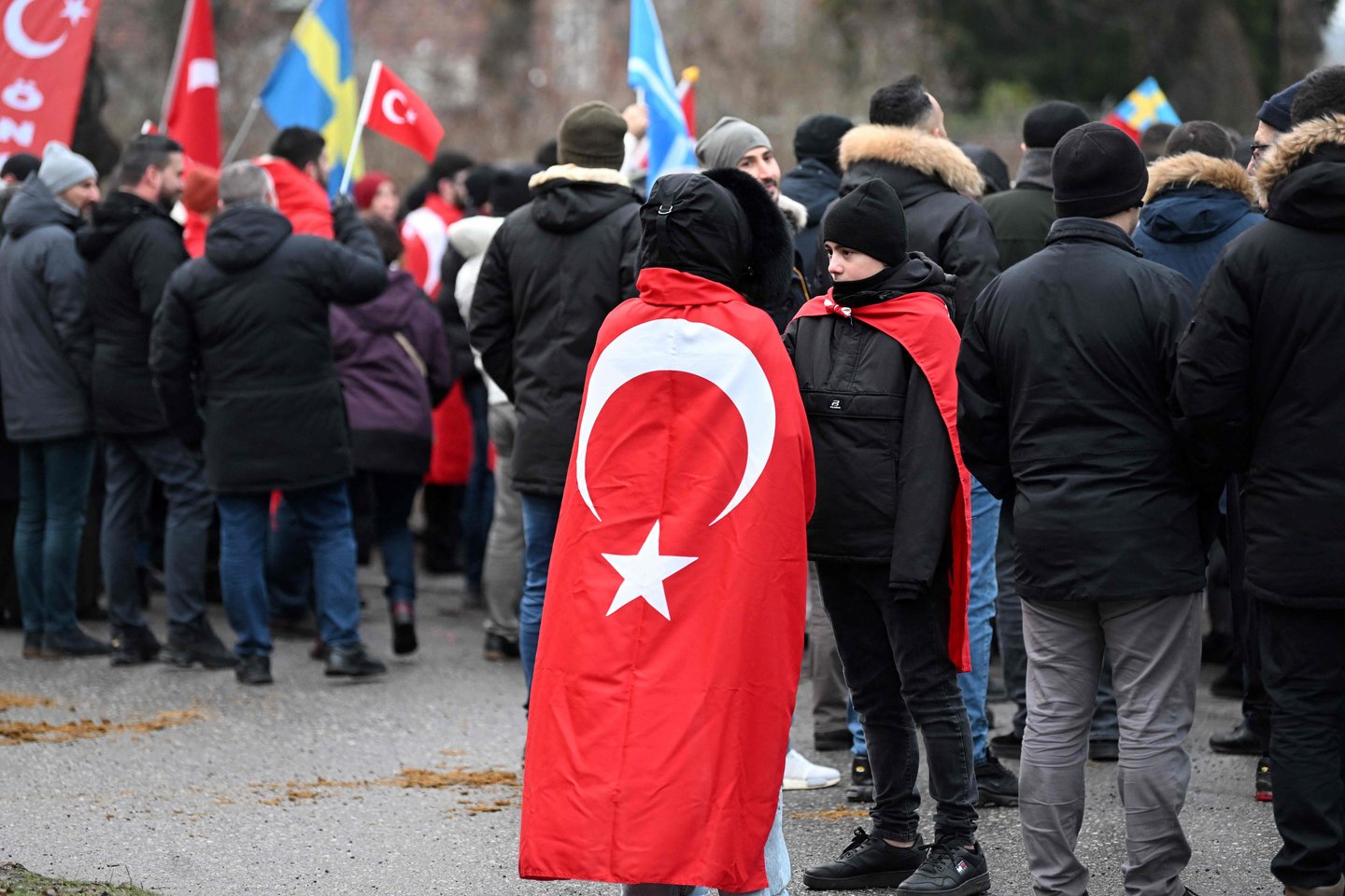 Turkija perspėjo savo piliečius dėl galimų diskriminacinių išpuolių Europoje ir Jungtinėse Valstijose po virtinės islamofobinių atakų.<br>AFP/Scanpix nuotr.