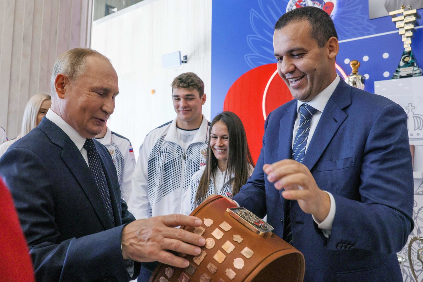 V.Putinas ir U.Kremliovas.<br>AFP/Scanpix nuotr.