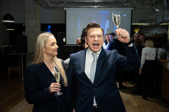 Valdas Benkunskas celebrates the elections results with his wife Vismantė.