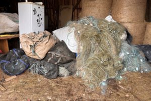 Aplinkosaugininkų reidai pasiteisino: sodyboje rasta beveik 160 tinklų