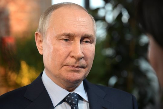  Vladimiras Putinas.