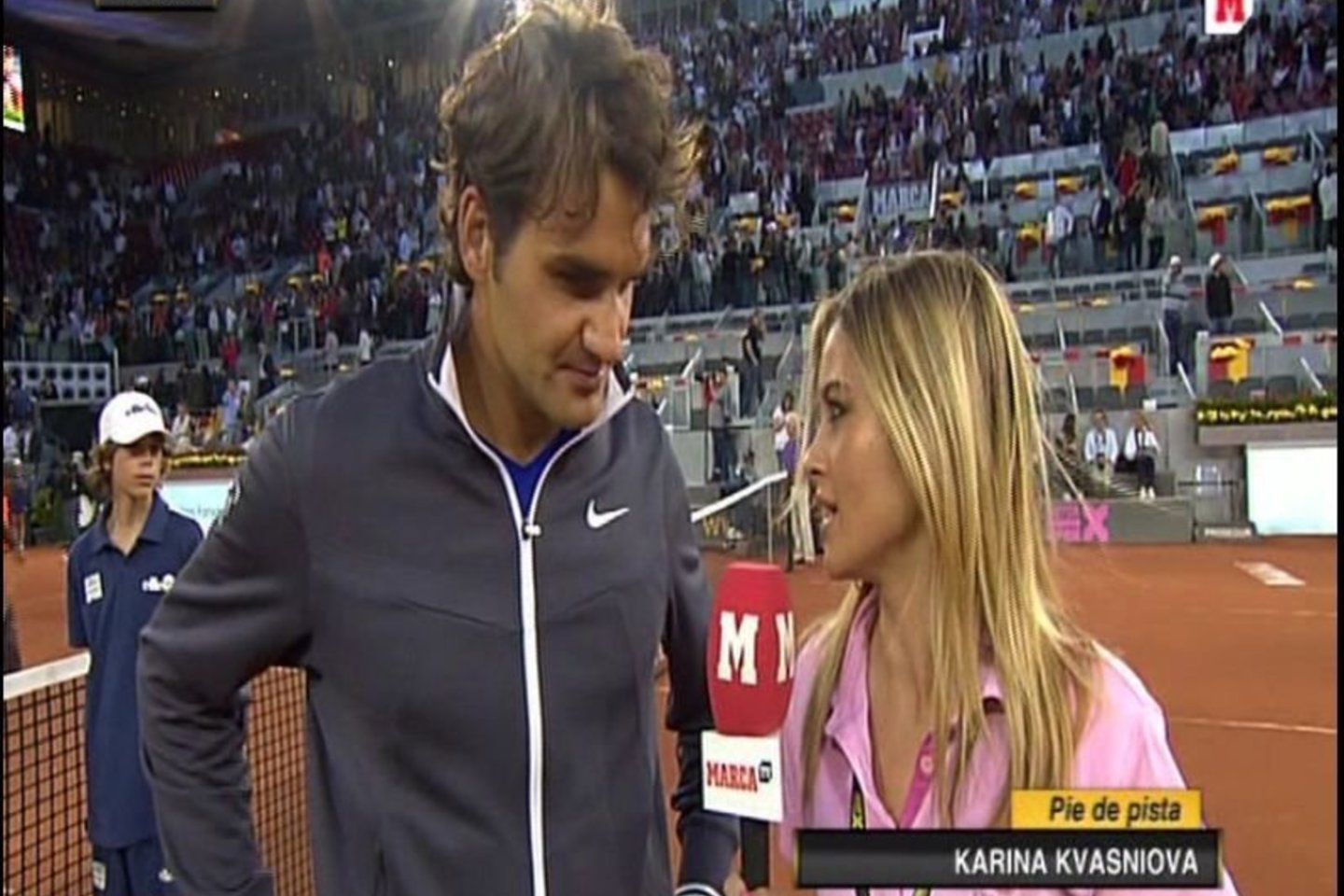  Dirbdama „Marca“ K.Kvašniova-Yague kalbino teniso žvaigždę Rogerį Federerį.