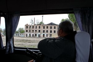 Ukrainoje iš darbo atleistas mikroautobuso vairuotojas, nepagarbiai elgęsis su žuvusio kario motina