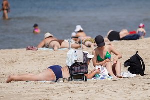 Saulės smūgis: kaip išvengti ir ko imtis jam ištikus?