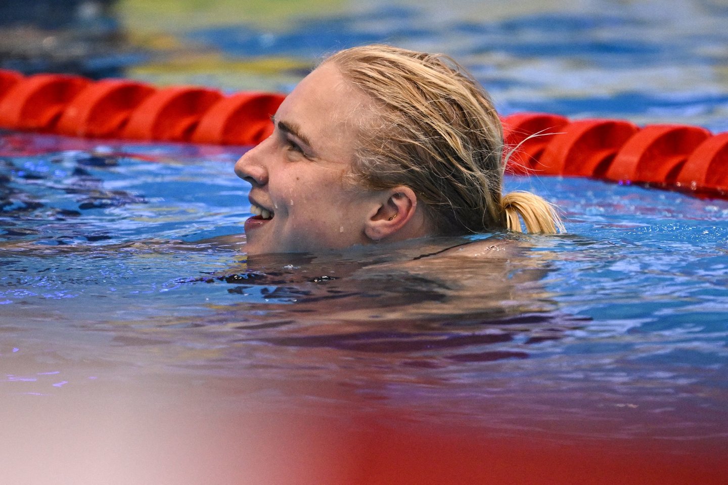 Rūta Meilutytė pasiekė pasaulio rekordą ir tapo čempione.<br>AFP/Scanpix nuotr.