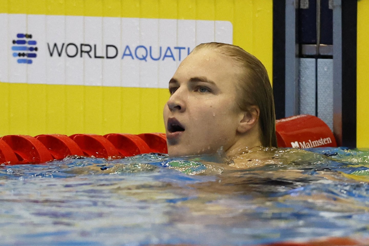 Rūta Meilutytė pasiekė pasaulio rekordą ir tapo čempione.<br>AFP/Scanpix nuotr.