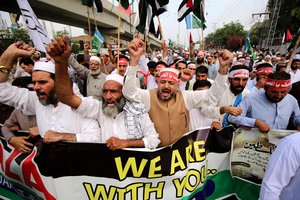 Tūkstančiai žmonių Pakistane, Jordanijoje, Irake išėjo į gatves, solidarizuodamiesi su palestiniečiais