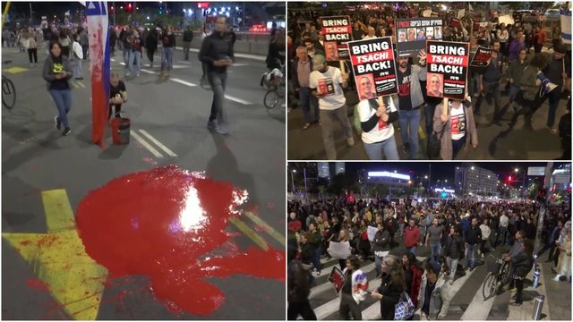 Vaizdai iš protesto Izraelyje: minios žmonių ir raudonais dažais nuspalvintinos gatvės