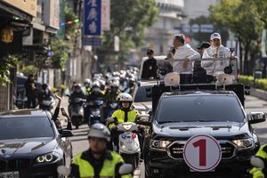 Artėjant rinkimams Taivane Kinija grasina ir salai, ir ją palaikančioms JAV