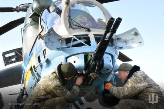  Nuotraukoje matyti retas atakos sraigtasparnis „Mi-24VP“.