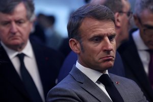 E. Macronas paragino sukurti „platų“ demokratinį aljansą prieš kraštutinius dešiniuosius