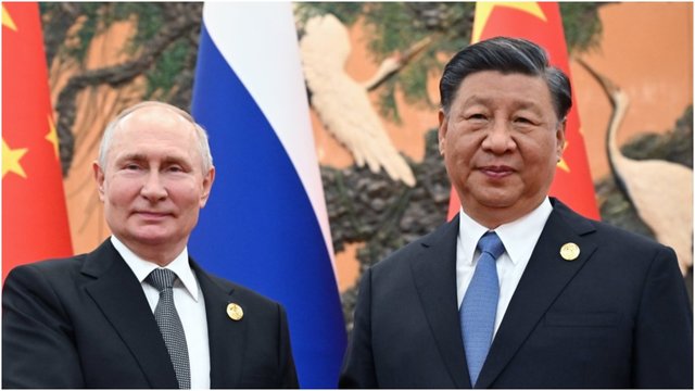 Kinijos žinutė NATO: perspėjo „neprovokuoti konfrontacijos“ dėl šalies ryšių su Rusija