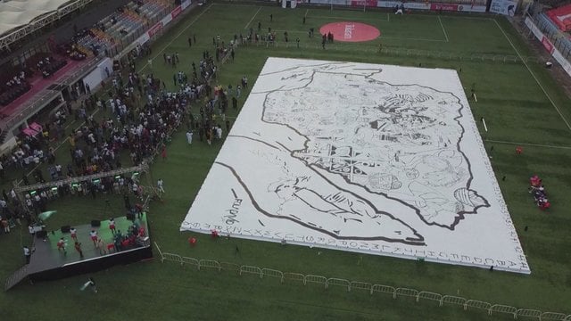 Nigerijos menininkas siekia Gineso rekordo už didžiausią piešinį pasaulyje: darbas nugulė Lagoso stadione
