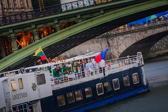 Lietuvos delegacija olimpinių žaidynių atidarymo ceremonijoje<br>Kipro Štreimikio/LTOK nuotr.