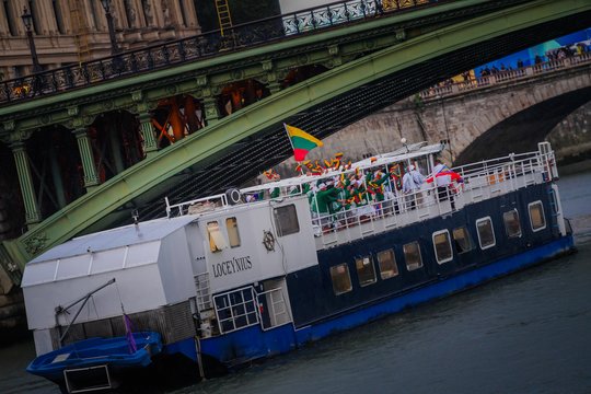 Lietuvos delegacija olimpinių žaidynių atidarymo ceremonijoje<br>Kipro Štreimikio/LTOK nuotr.