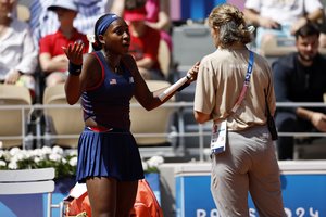 Amerikos vėliavnešė baigė pasirodymą olimpiados teniso vienetų varžybose