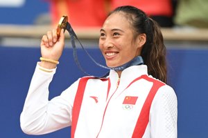 Olimpinėse teniso varžybose auksu suspindo Kinijos sportininkė