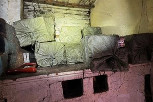 Kontrabandininkų palikti pėdsakai pasieniečius atvedė iki baltarusiškų cigarečių „sandėlio“