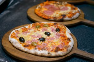 Vokietijos picerijoje – didelis policijos reidas: sulėkė sužinoję, ką reiškia pica „numeris 40“