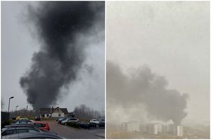 Į dangų Vilniuje pakilo juodų dūmų stulpas – buvusiame garažų masyve vėl degė atliekos