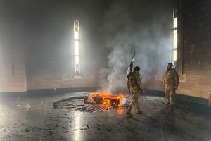 Sirijos sukilėliai padegė B. al-Assado tėvo kapą