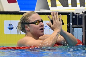 R. Meilutytė beveik rekordiniu greičiu įplaukė į pasaulio čempionato finalą