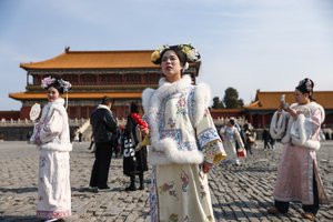 Kinijoje pirmą kartą per 13 mėnesių užfiksuota defliacija