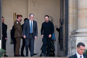 Paryžiuje susirinkę Europos lyderiai sutarė – dabar ne metas atšaukti sankcijas Rusijai