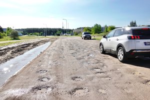 ​Sostinės naujų namų kvartale sieks sutvarkyti duobėmis nusėtą žvyrkelį