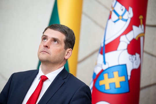 Žemaitaitis appeared at the protest and was surrounded by a crowd: harsh insults were hurled, and an enraged man tried to knock him down