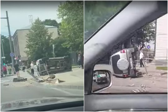 Judrioje Kauno gatvėje apsivertė automobilis: virsdamas išgriovė tvoras