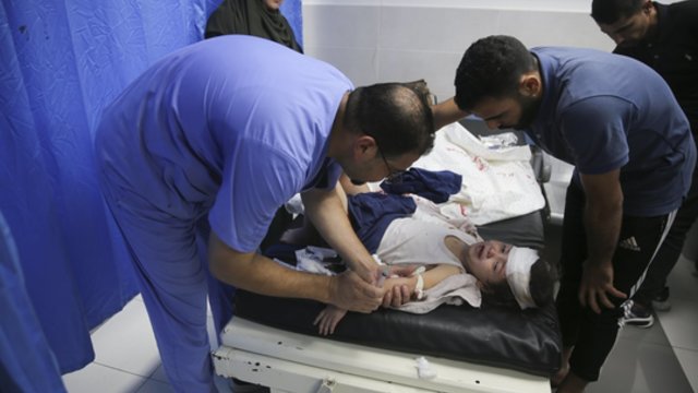 Kraupus incidentas prekių dalijimo centre Gazos Ruože: žuvo 20 žmonių