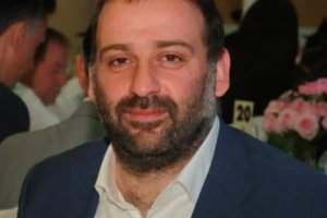 Buvęs V. Zelenskio verslo partneris įklimpo į skandalą: prieš kratas pabėgo iš šalies