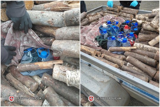 Jurbarko pareigūnai aptiko malkų krovinyje gabentą naminę degtinę