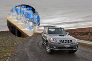 Išsipylęs mineralinio buteliukas vairuotojui atnešė tūkstantines remonto sąskaitas: kaip tai nutiko