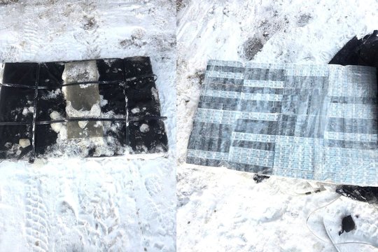 Pasieniečiai iš Nemuno ištraukė kontrabandininkų „plaustą“ su nelegaliomis cigaretėmis